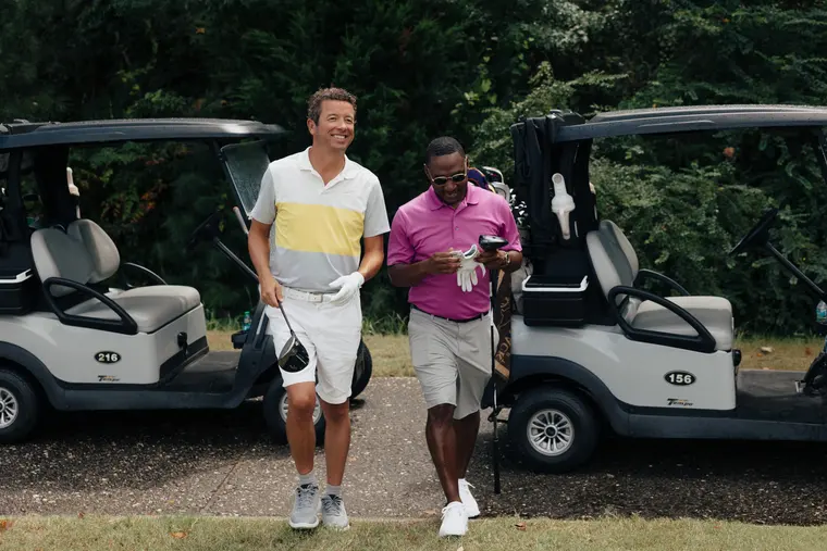A planner walking the course with a group