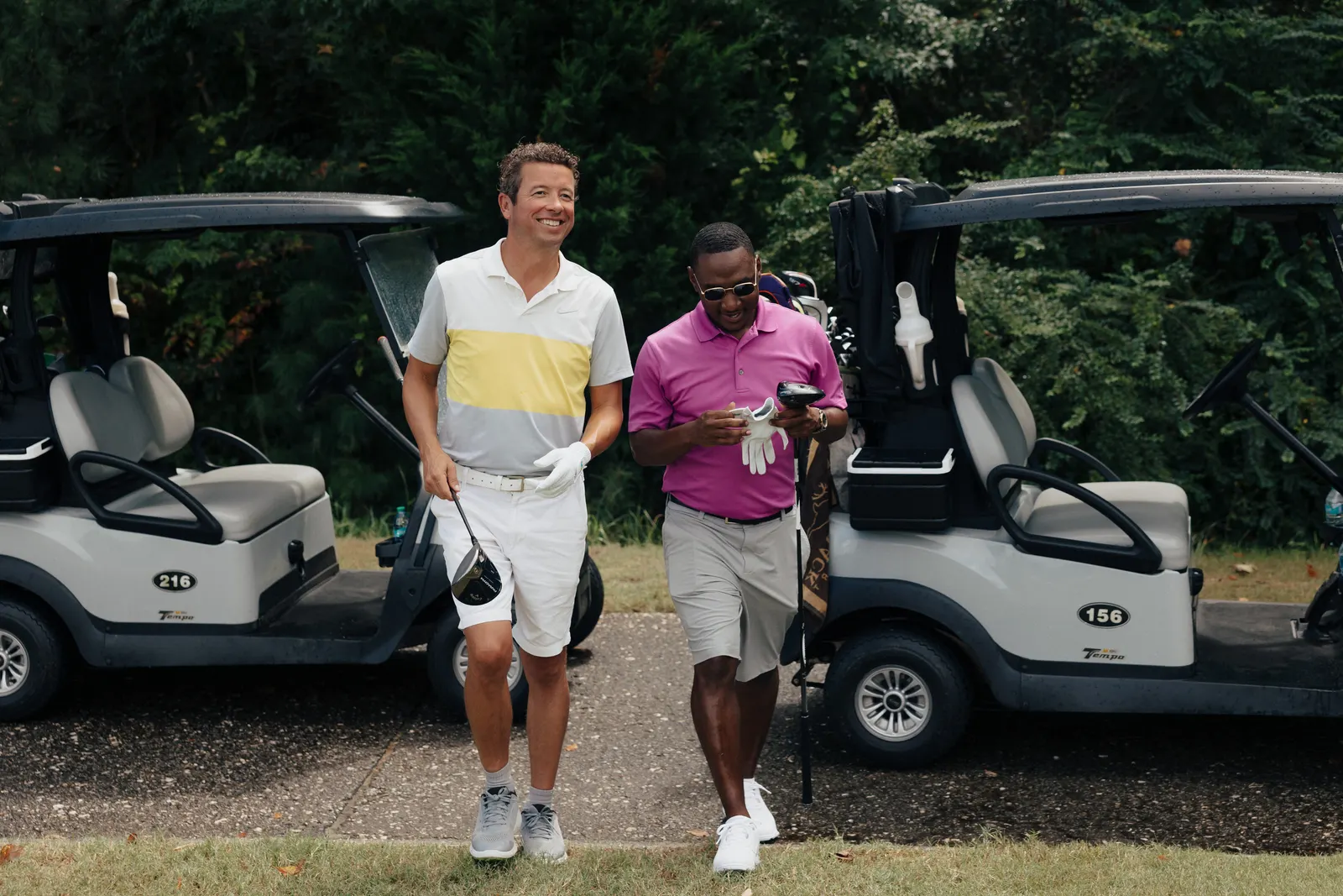 Golfers heading out from the cart barn